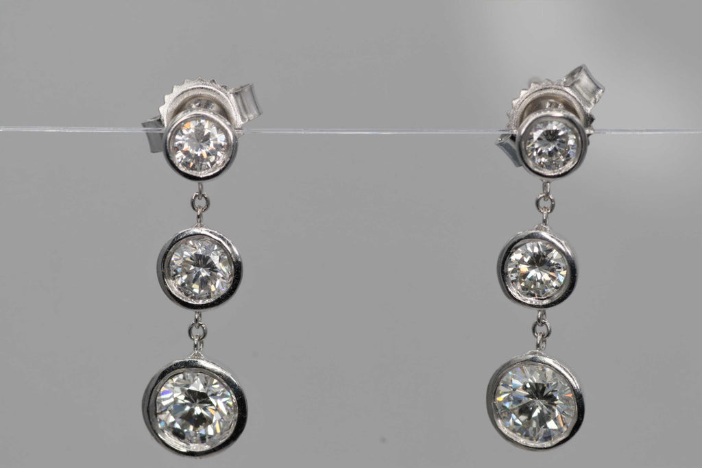 Ladies 14k white gold diamond dangle earrings