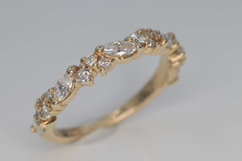 Ladies 14k yellow gold Marquise and round shaped diamond wedding ring