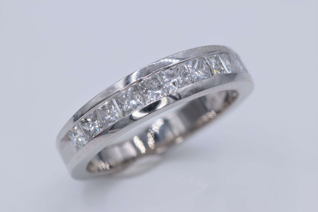 Ladies 14k white gold diamond channel set wedding ring