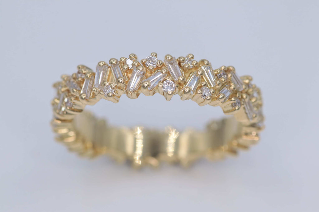 Ladies 18k yellow gold Baguette and round diamond eternity ring