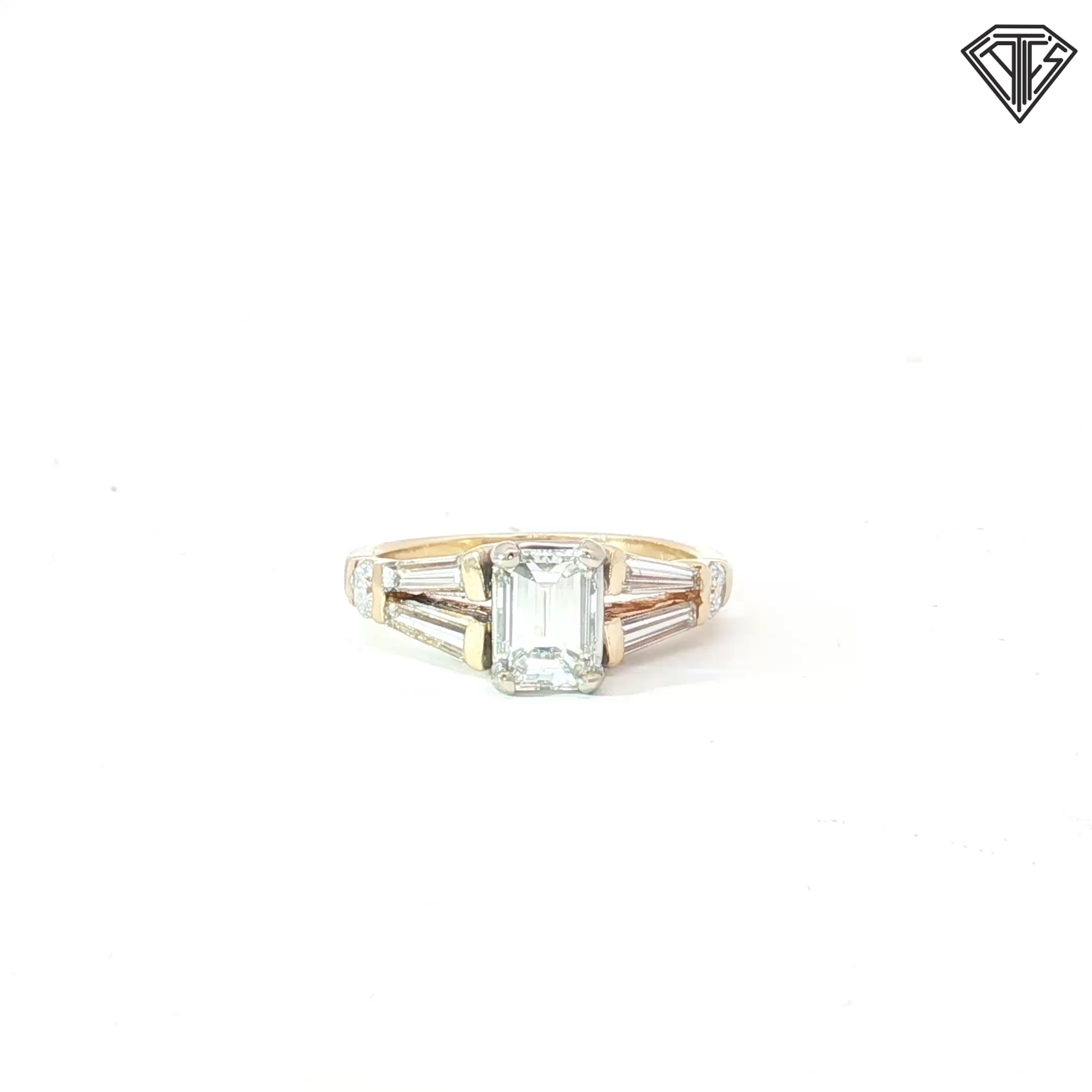 14k Two Tone 1.00ct I VS1 Emerald Cut Diamond/ (2)  .50ct E VS2 Tapered Baguette Shape  Diamond and (2) .25ct E VS2 Round Diamond  Engagement Ring Size 7 Certified By GIA #2223349315