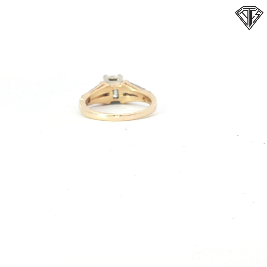 14k Two Tone 1.00ct I VS1 Emerald Cut Diamond/ (2)  .50ct E VS2 Tapered Baguette Shape  Diamond and (2) .25ct E VS2 Round Diamond  Engagement Ring Size 7 Certified By GIA #2223349315