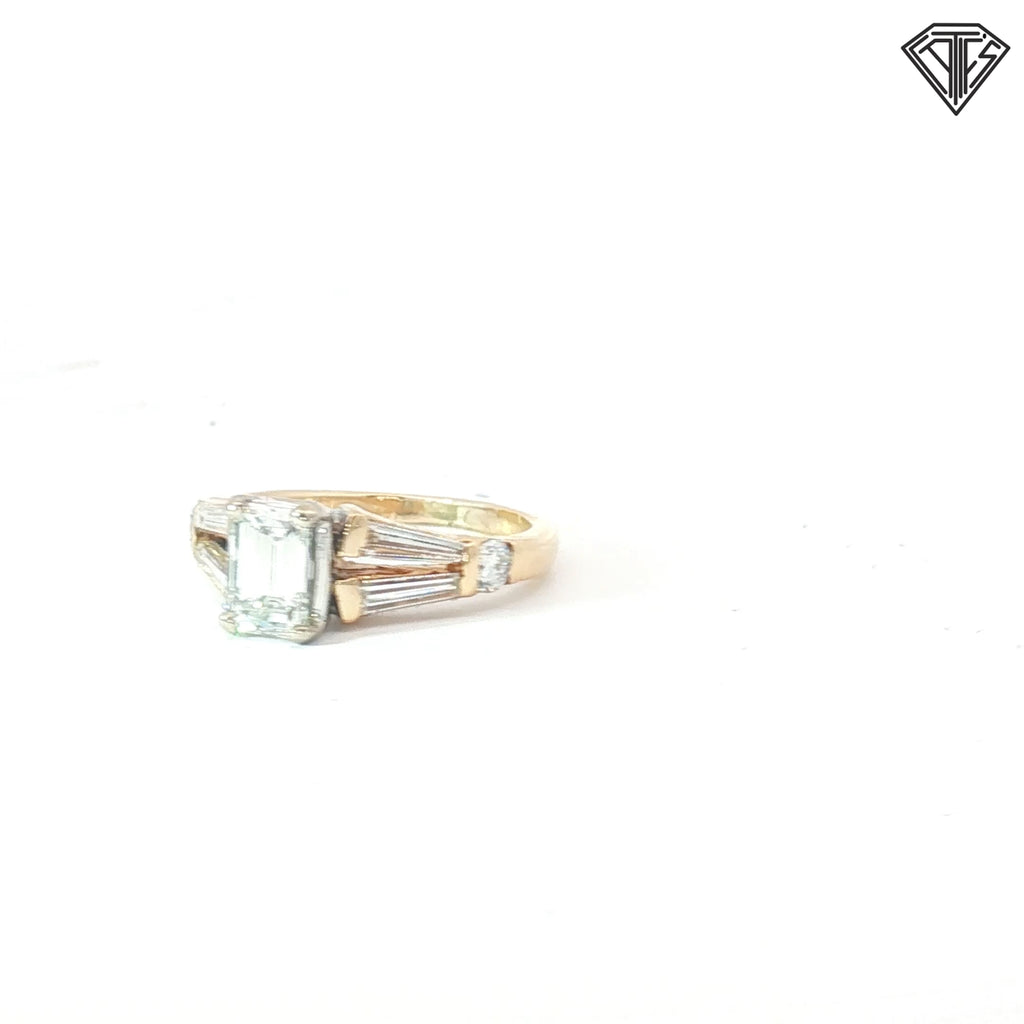 14k Two Tone 1.00ct I VS1 Emerald Cut Diamond/ (2)  .50ct E VS2 Tapered Baguette Shape  Diamond and (2) .25ct E VS2 Round Diamond  Engagement Ring Size 7 Certified By GIA #2223349315