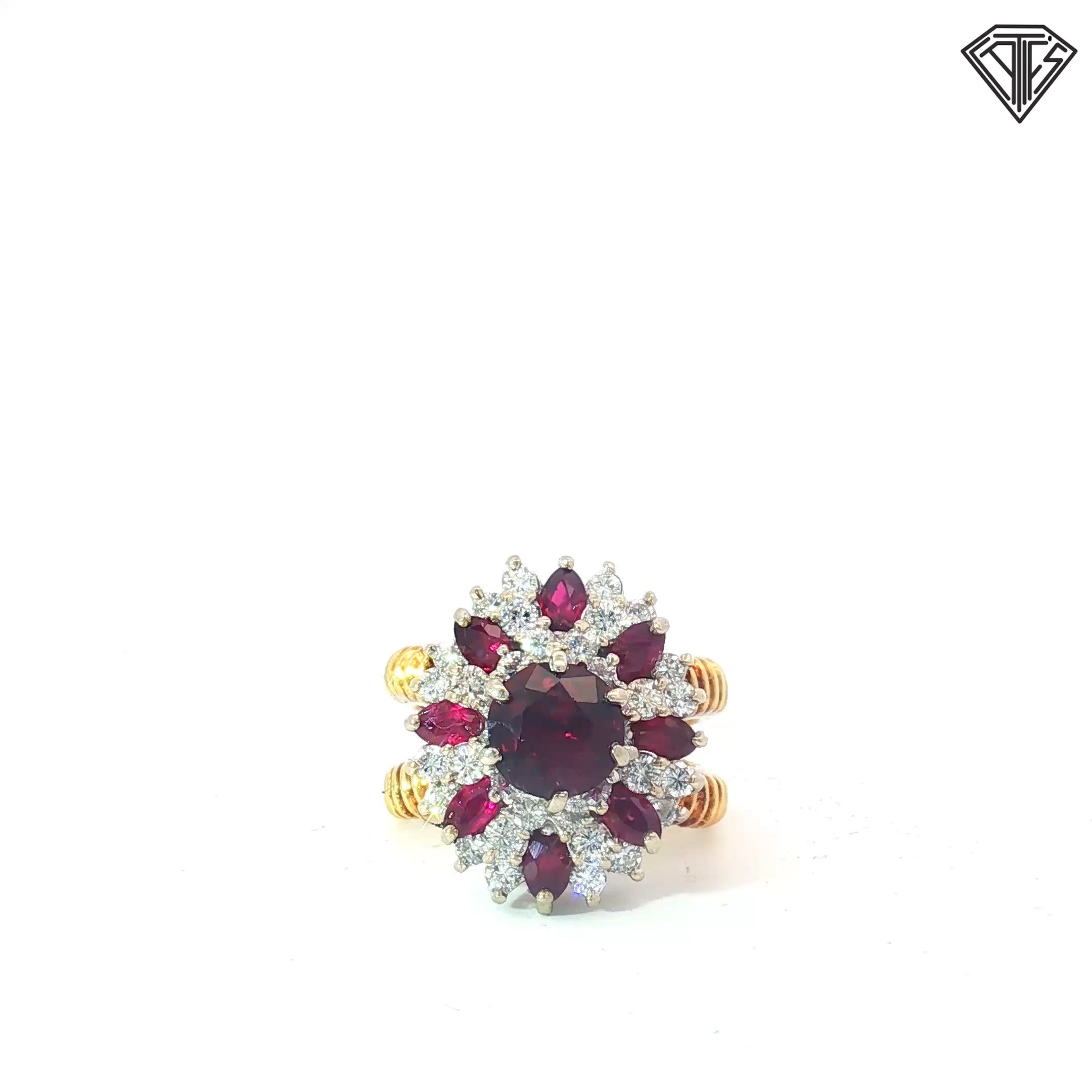 18k Two Tone 1.82ct Round Purplish-Red Ruby Center with Approximately / 1.00ct Marquise Cut Rubies /1.00ct  VS-SI , Near Colorless Bold-High profile cluster design with excellent finger presence and substantial construction Size 6.5