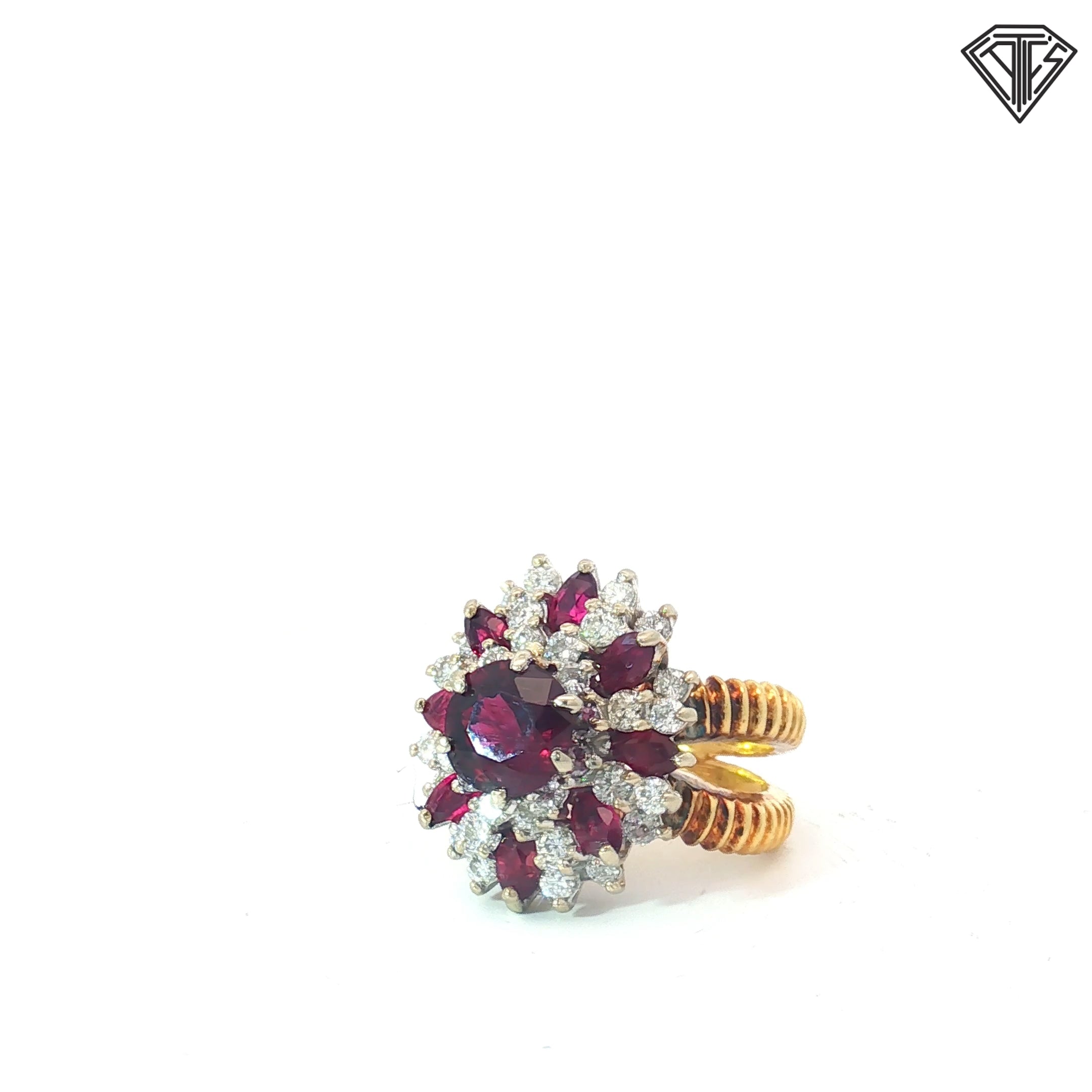 18k Two Tone 1.82ct Round Purplish-Red Ruby Center with Approximately / 1.00ct Marquise Cut Rubies /1.00ct  VS-SI , Near Colorless Bold-High profile cluster design with excellent finger presence and substantial construction Size 6.5