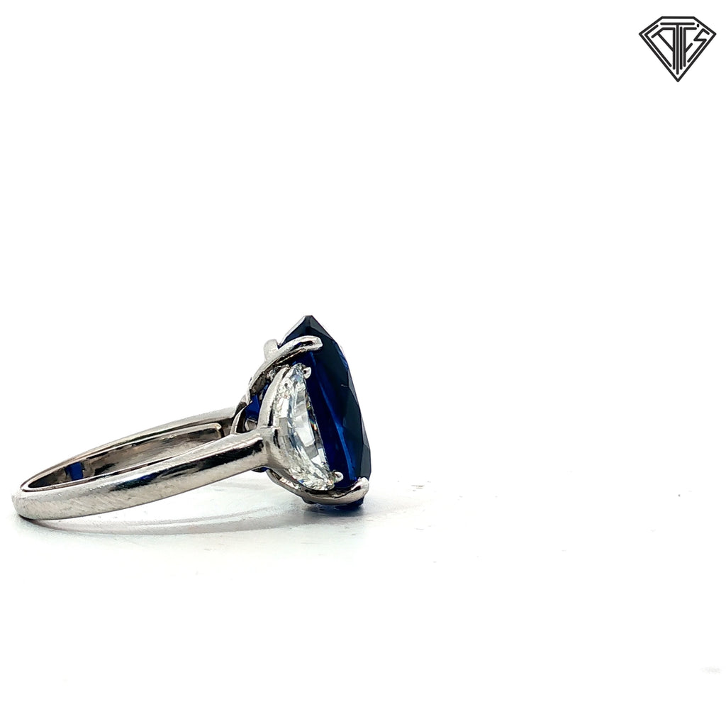 GIA #1232933955 10.12 Sapphire Sri Lanka Heat Set in platinum alongside 2 half moons appx. 2.1ct H-I Si1-Vs2