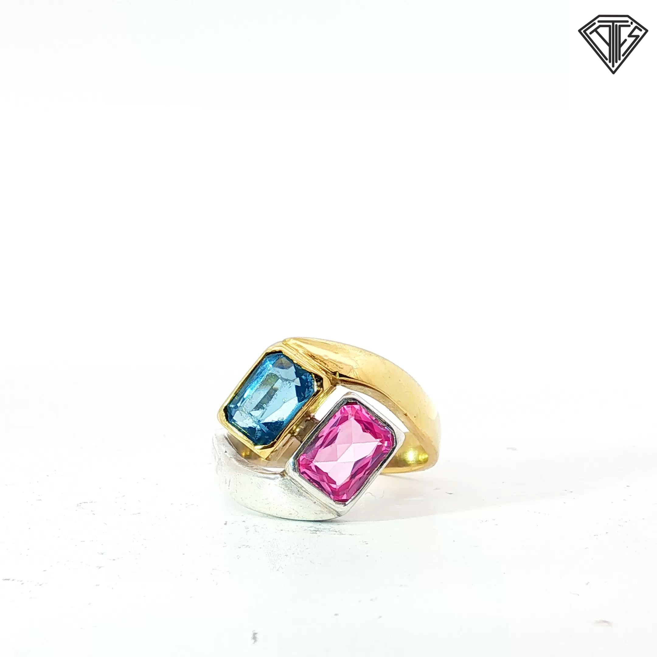 14k Yellow Gold and Silver Toi et Moi with 7x5 Emerald Cut Pink/ Blue Topaz Ring Size 6