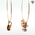 Pre-Loved Louis Vuitton 18k Yellow Gold Creole Pearl and Monogram Charm Hoop Earrings