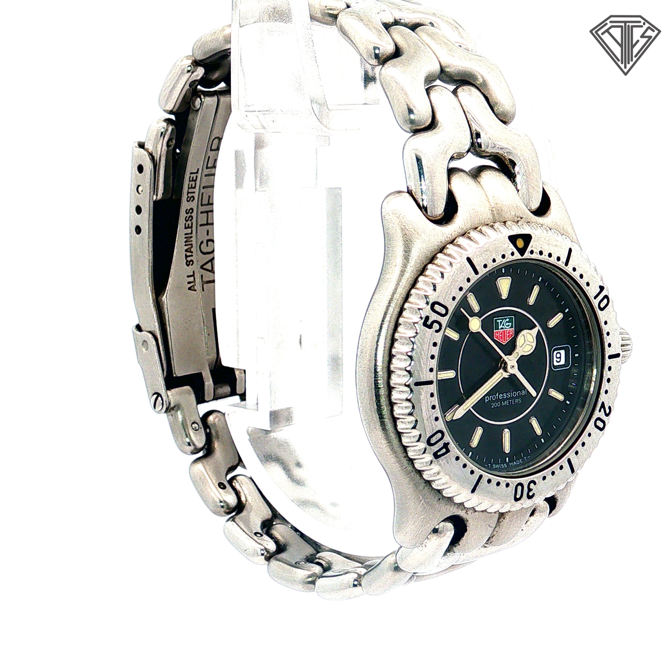 Pre-Owned Tag Heuer Stainless Steel / Quartz Movement/ Black Dial / WG1120/ Original Paper/ No Box / 38mm