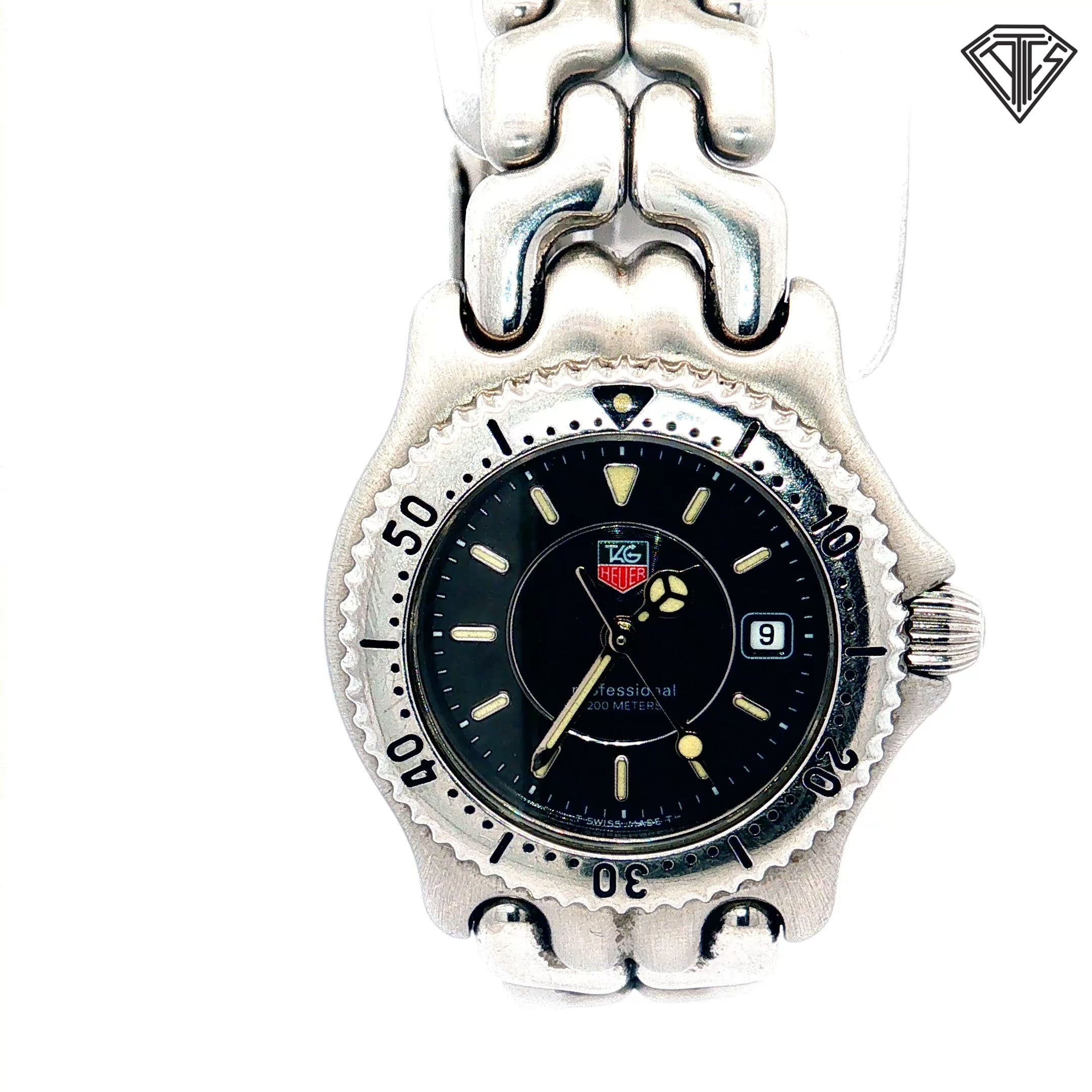 Pre-Owned Tag Heuer Stainless Steel / Quartz Movement/ Black Dial / WG1120/ Original Paper/ No Box / 38mm