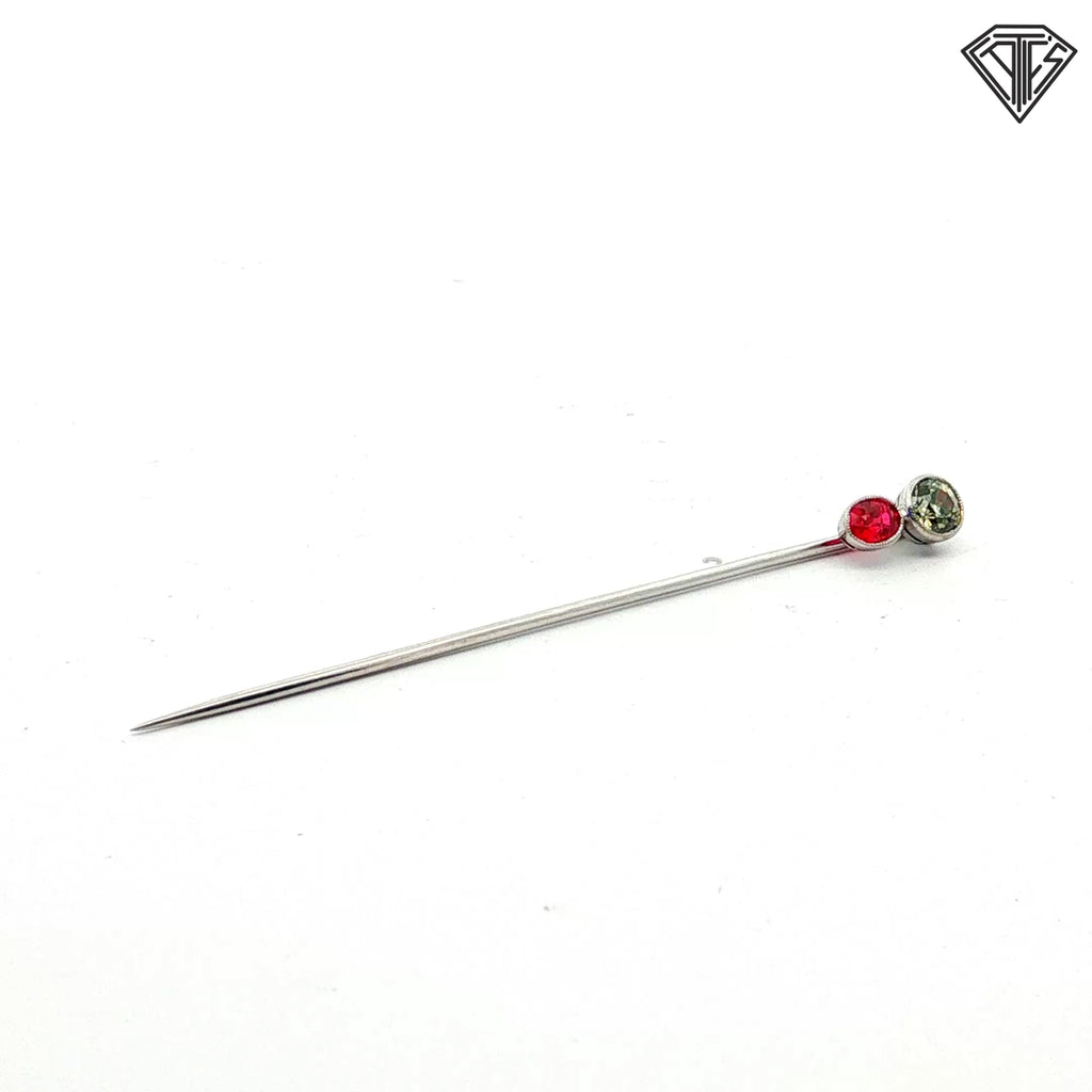 Platinum Stick pin with an approximately .50ct natural Chameleon Diamond Certified By GIA # 2245012586 accompanied by a synthetic ruby