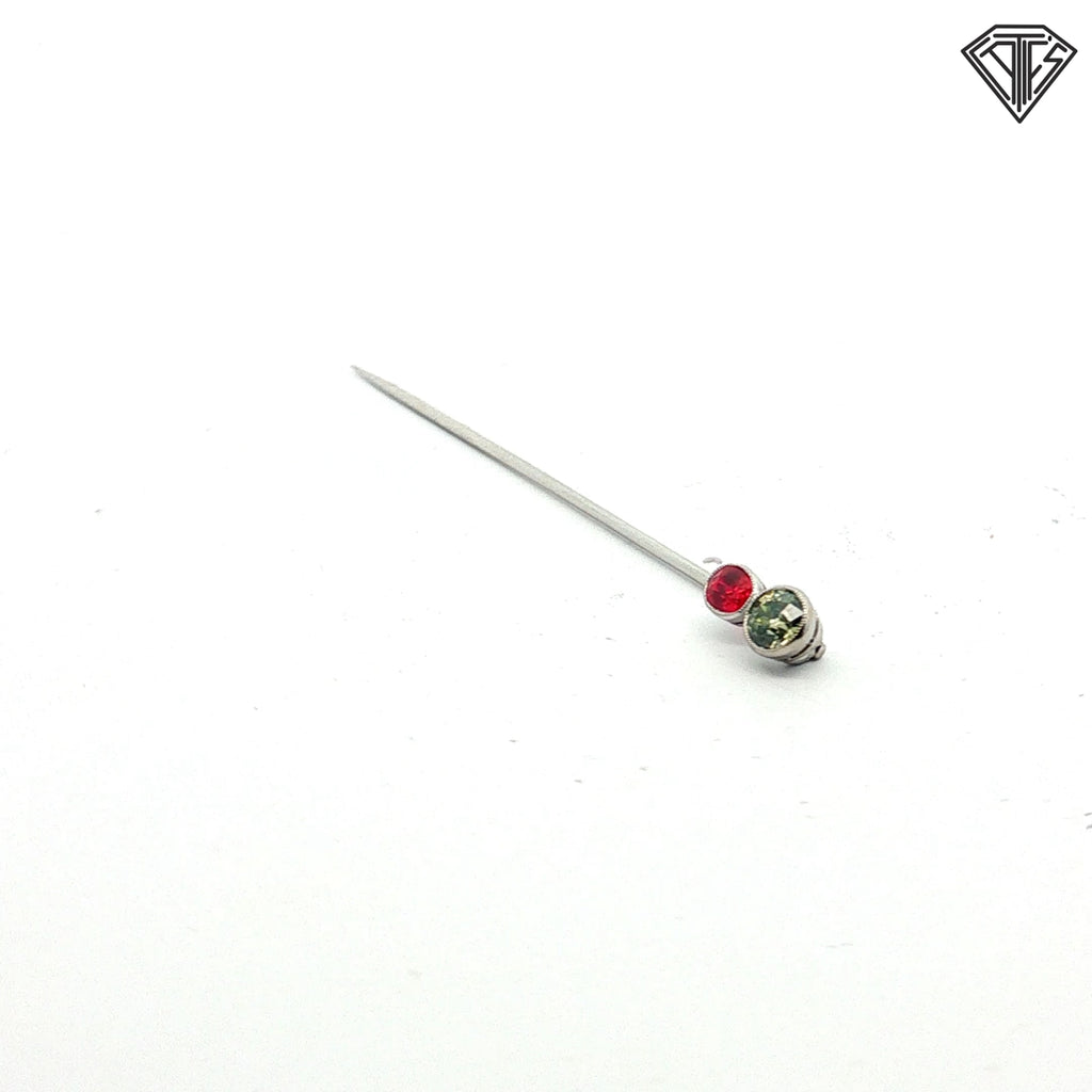 Platinum Stick pin with an approximately .50ct natural Chameleon Diamond Certified By GIA # 2245012586 accompanied by a synthetic ruby