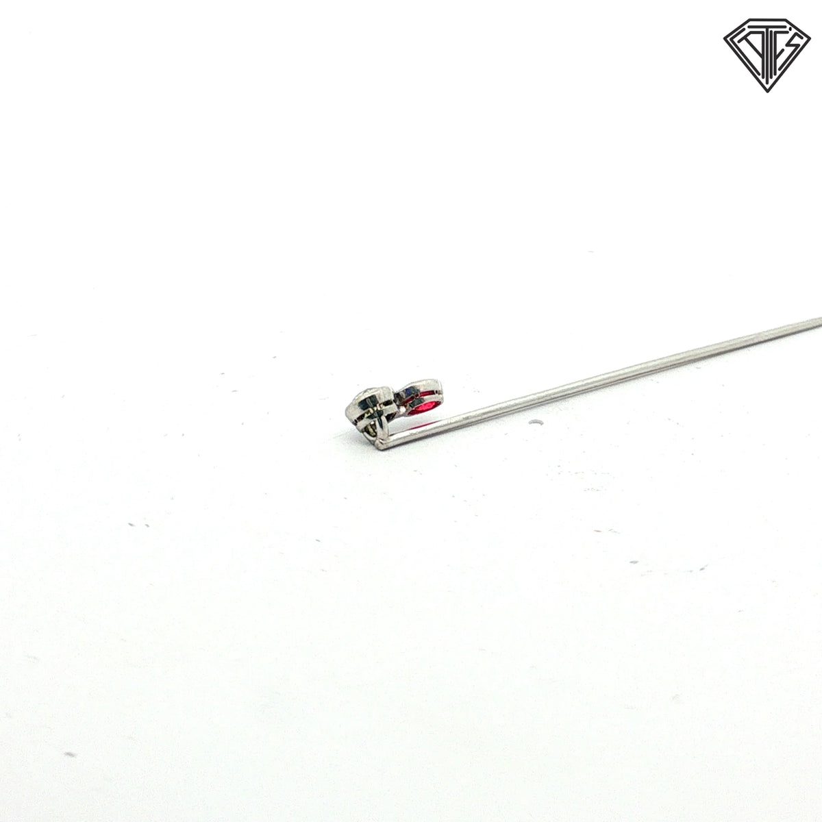 Platinum Stick pin with an approximately .50ct natural Chameleon Diamond Certified By GIA # 2245012586 accompanied by a synthetic ruby