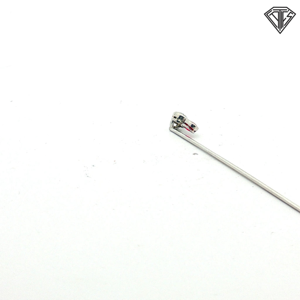 Platinum Stick pin with an approximately .50ct natural Chameleon Diamond Certified By GIA # 2245012586 accompanied by a synthetic ruby