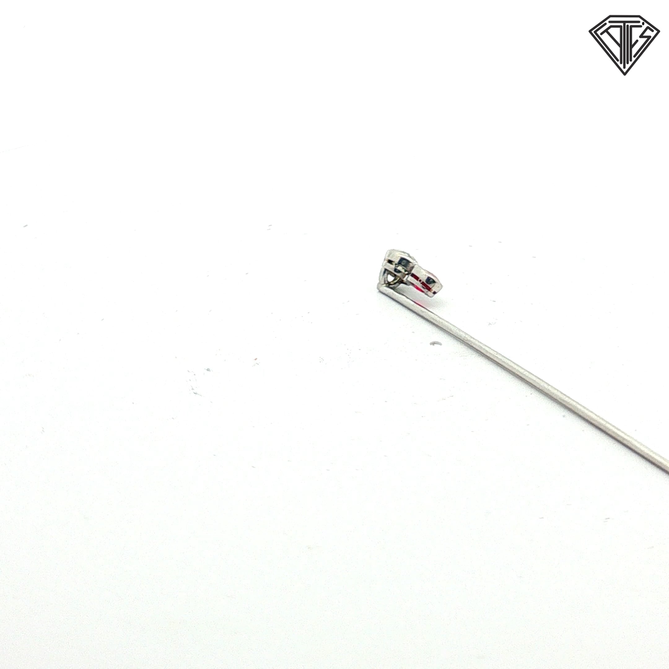 Platinum Stick pin with an approximately .50ct natural Chameleon Diamond Certified By GIA # 2245012586 accompanied by a synthetic ruby