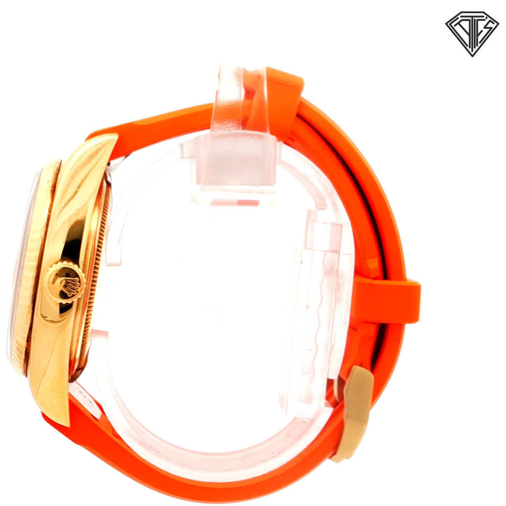 Pre-Owned Rolex Presidential 18k Yellow Gold Case /Fluted Bezel /Silver Sun Burst Dial/ Roman Numeral / Automatic / Day and Date / 36mm / Horus Orange Rubber Strap Watch Ref:1803