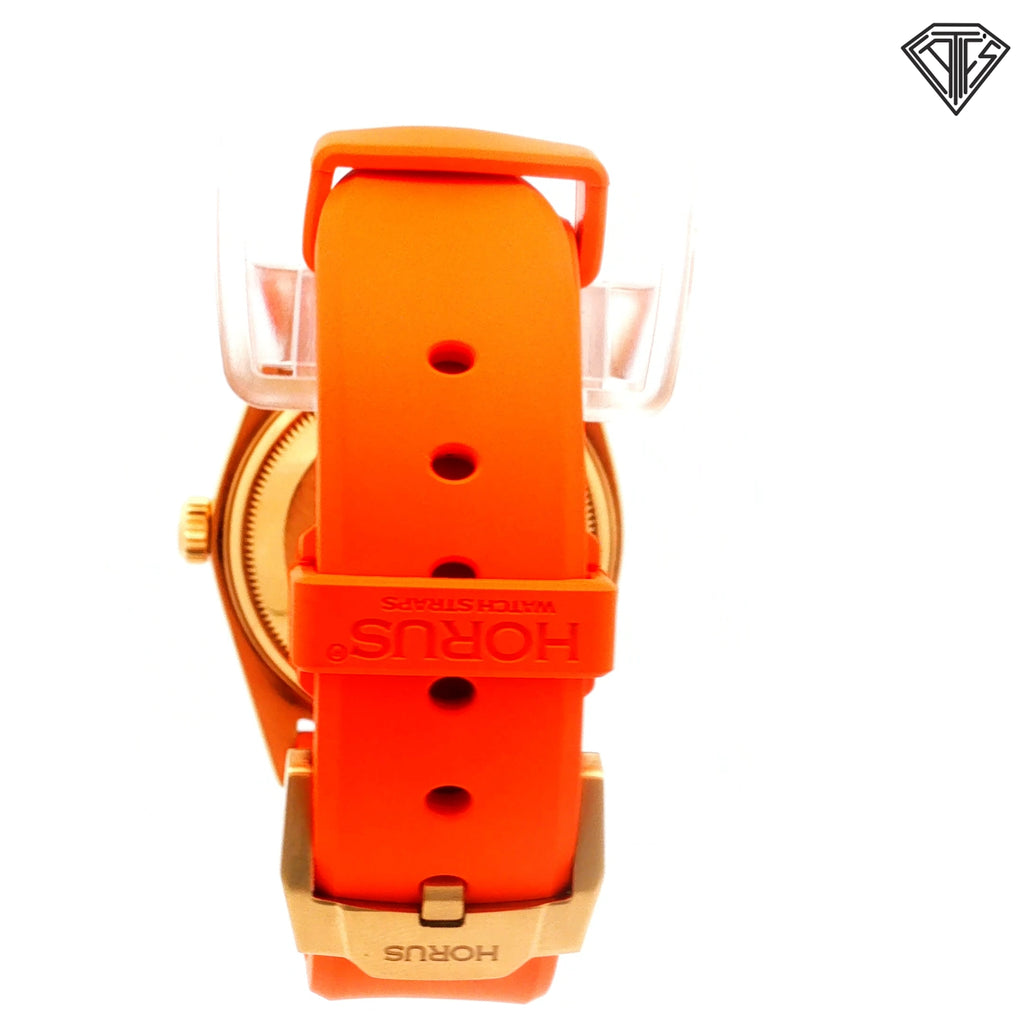 Pre-Owned Rolex Presidential 18k Yellow Gold Case /Fluted Bezel /Silver Sun Burst Dial/ Roman Numeral / Automatic / Day and Date / 36mm / Horus Orange Rubber Strap Watch Ref:1803