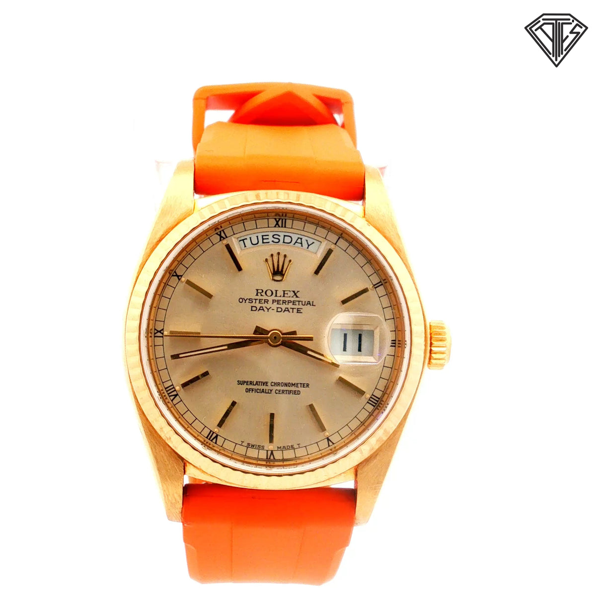 Pre-Owned Rolex Presidential 18k Yellow Gold Case /Fluted Bezel /Silver Sun Burst Dial/ Roman Numeral / Automatic / Day and Date / 36mm / Horus Orange Rubber Strap Watch Ref:1803