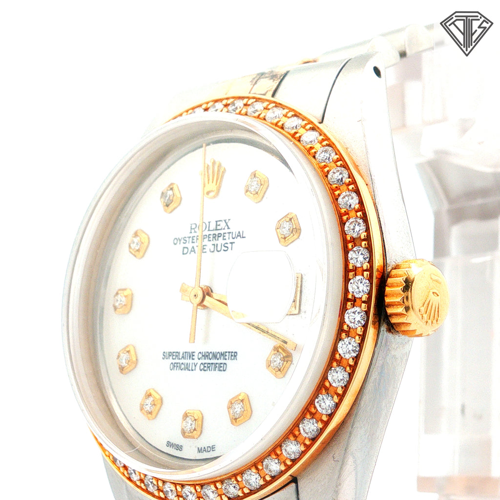 Pre-Owned Rolex DateJust Two-Tone 18k Yellow Gold and Stainless Steel/ Jubilec Band/ Mother of Pearl Dial / Diamond Hour Mark/ Pave Diamond Bezel/ 36mm /Automatic Movement/ Sapphire Crystal/ Ref: 16233