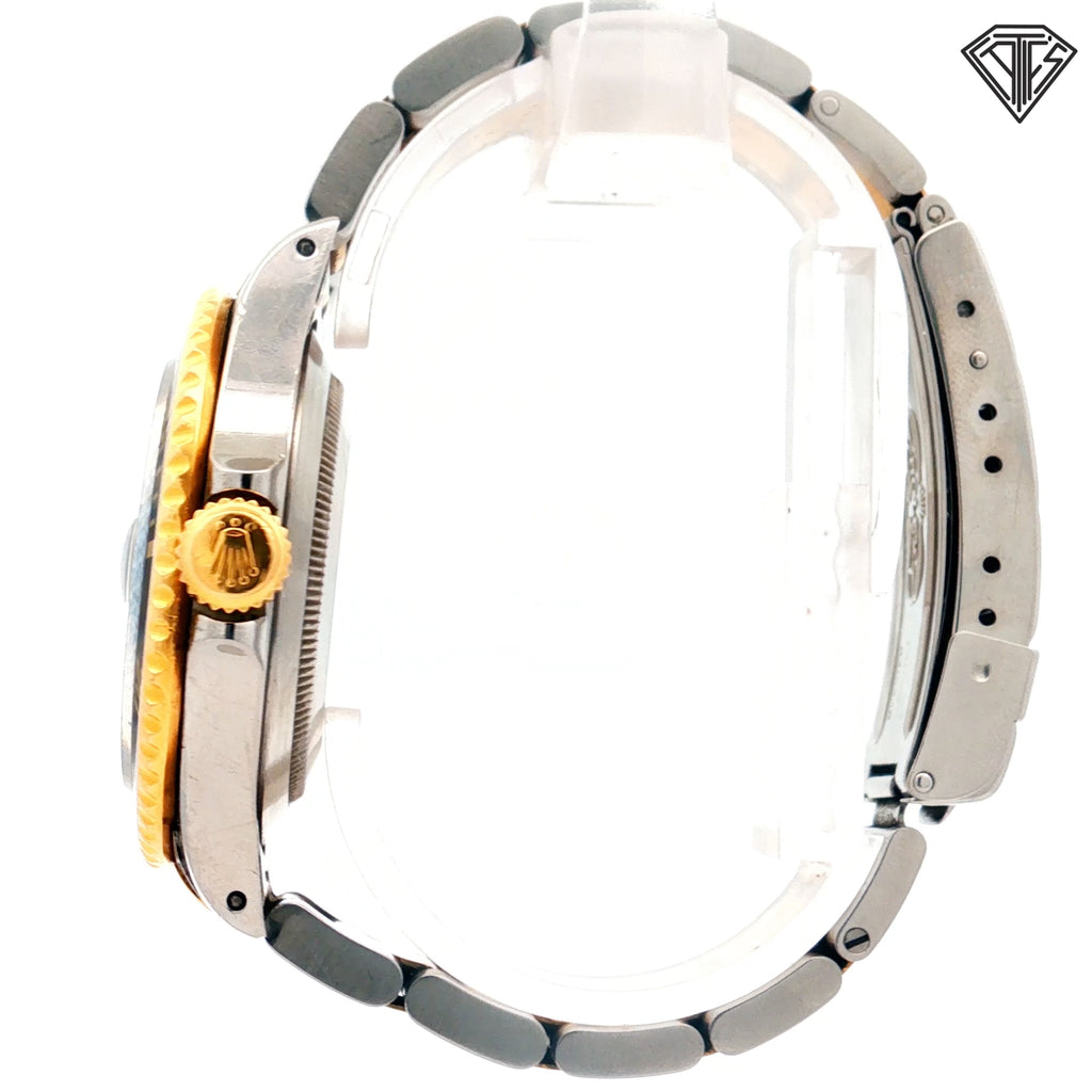 Pre-Owned Rolex Submariner Two Tone 18k Yellow Gold and Stainless Steel/ Black Dial /Black Aluminum Bezel / 40mm/ Automatic Movement /Ref:16613