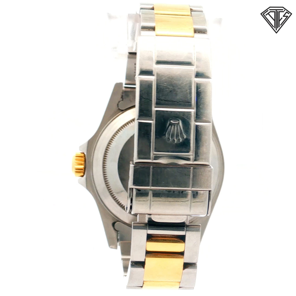 Pre-Owned Rolex Submariner Two Tone 18k Yellow Gold and Stainless Steel/ Black Dial /Black Aluminum Bezel / 40mm/ Automatic Movement /Ref:16613