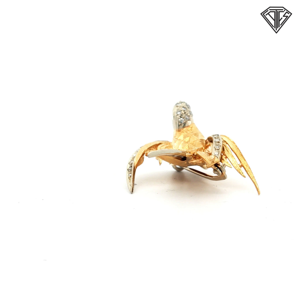 18k Two Tone .20ct Round Single Cut with Ruby Accented Eye Dove Brooch 10 gram