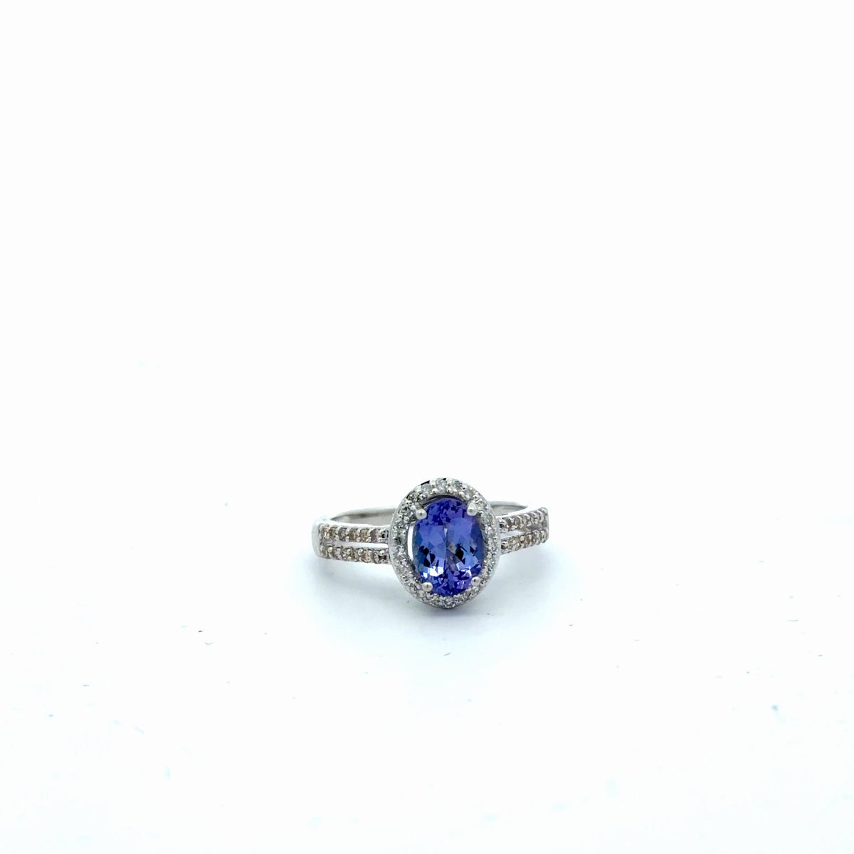 14k White Gold 1.30ct Oval Tanzanite /.30ct Round Champagne / .20ct H SI1 Round Diamond Ring  Size 7  3.30 gram