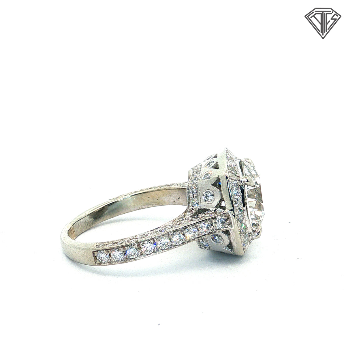 18k White Gold 3.07ct G SI2 Round Diamond / Halo Setting / Pave Diamond Melle / Along Side and Shank Total Diamond Weight  1.15ct G SI2 Round Diamond   Size  5.75   Certified By EGL USA #  US61446201