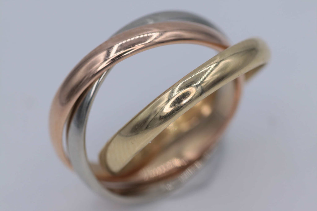 Ladies 18k Tri color pre-owned Cartier Trinity ring