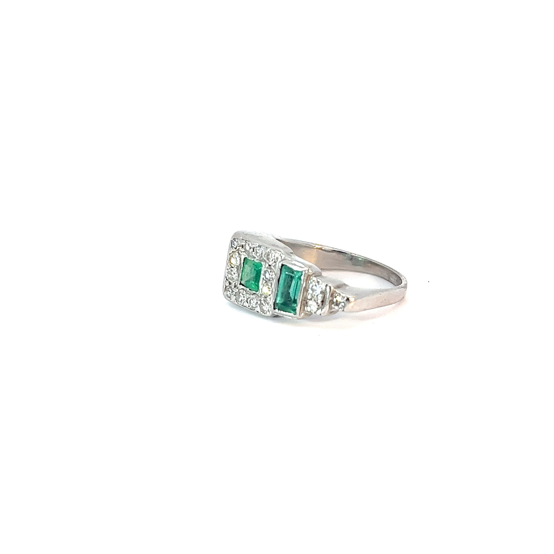 Platinum Emerald Shape and Princess Cut  Emerald and Round Diamond Ring