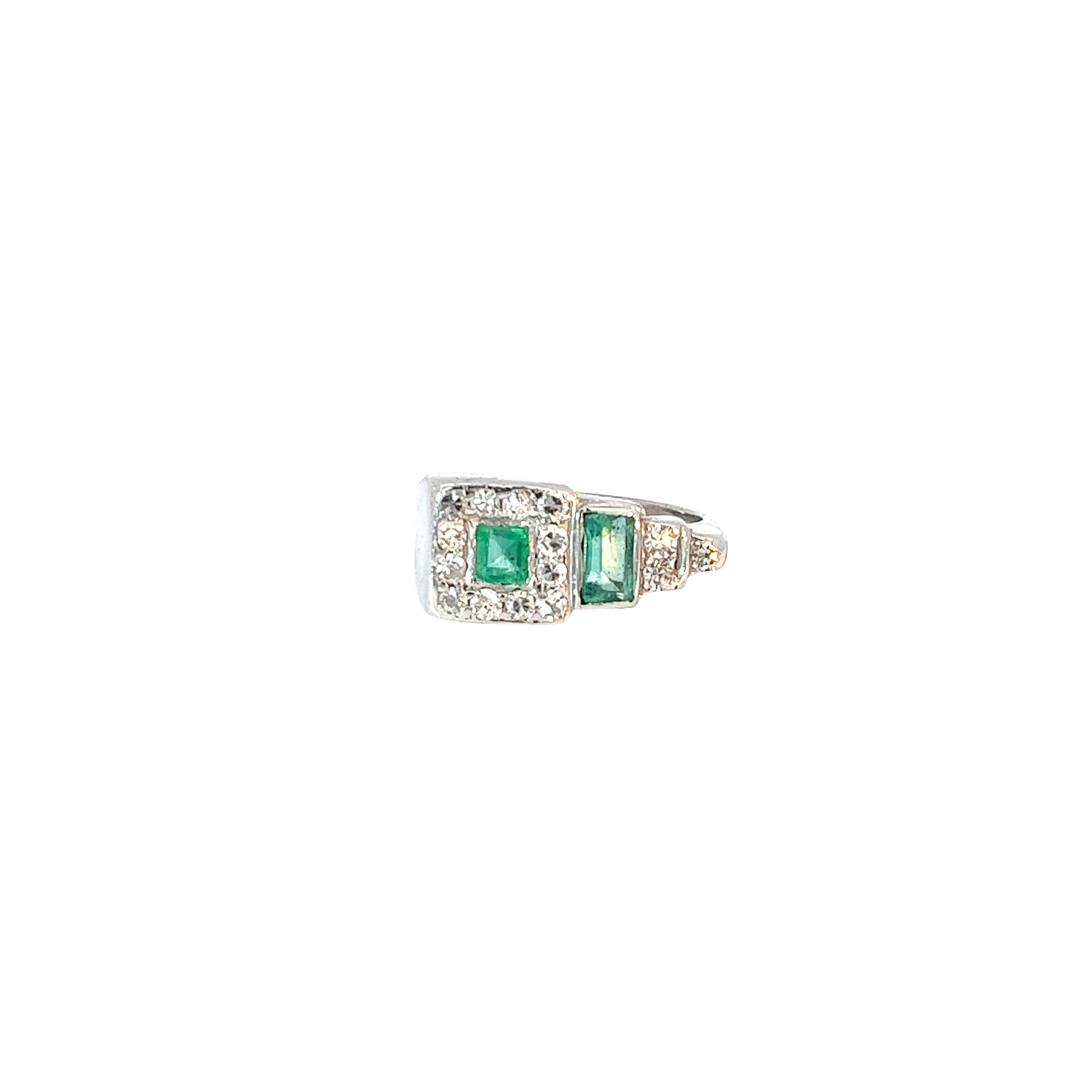 Platinum Emerald Shape and Princess Cut  Emerald and Round Diamond Ring