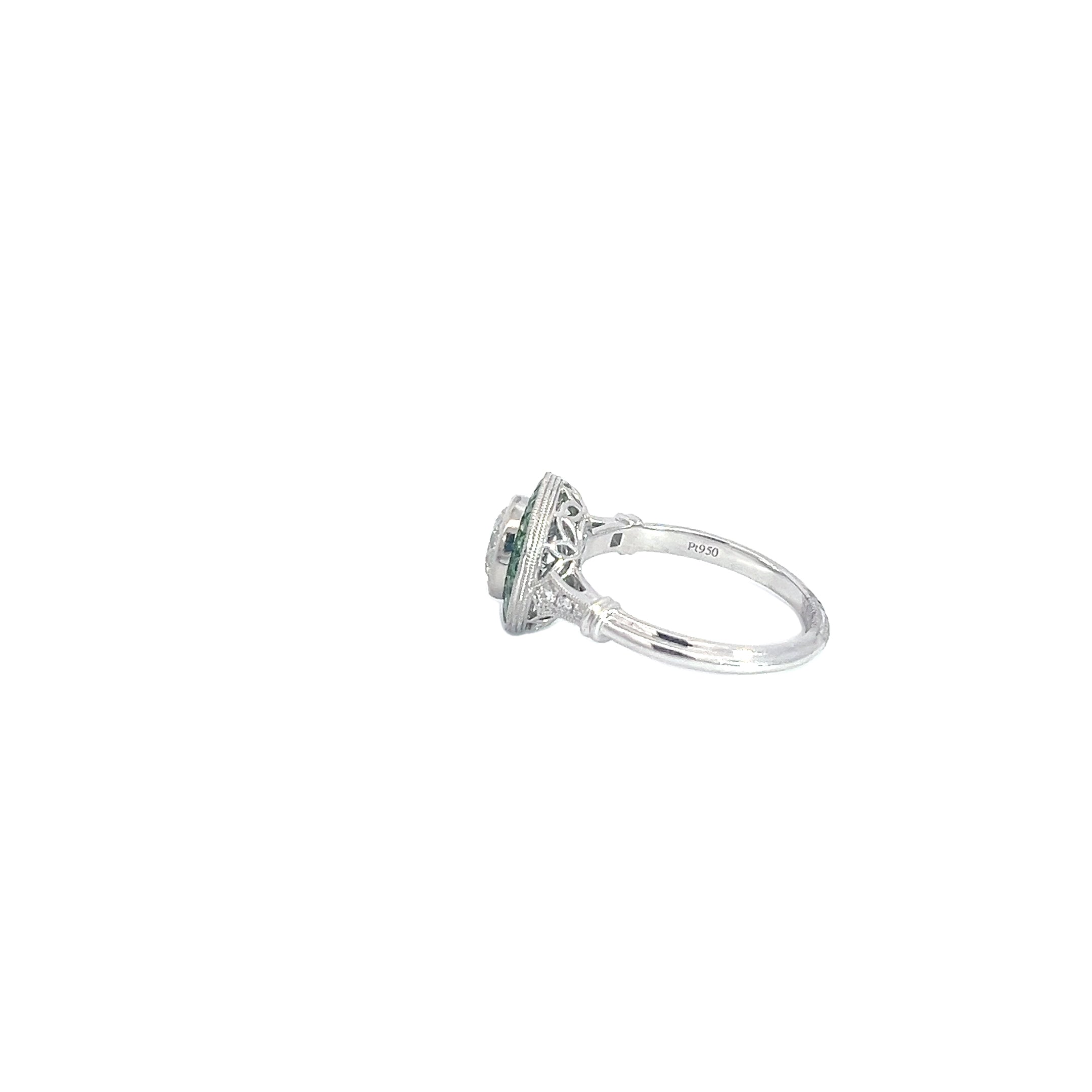 PLATINUM 1.00ct I SI2 Round Diamond Center Stone , .70ct Princess Cut Tsavorite on the halo and  along the band .06ct  Round Diamond Certified by GIA #7453028986