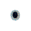 18k White Gold 18.00ct Oval shaped Onyx/ 3.00ct Pear Shaped Blue Topaz and .75ct G VS1 Round Diamond Ring