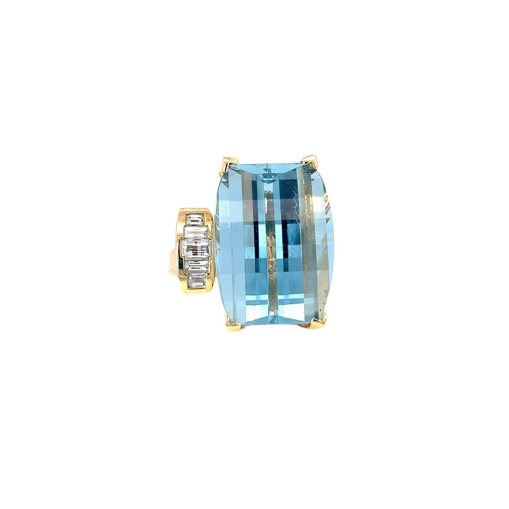 14k Yellow Gold 38.00ct Emerald Cut Blue Topaz and .85ct G SI1 Baguette Shaped Diamond Ring