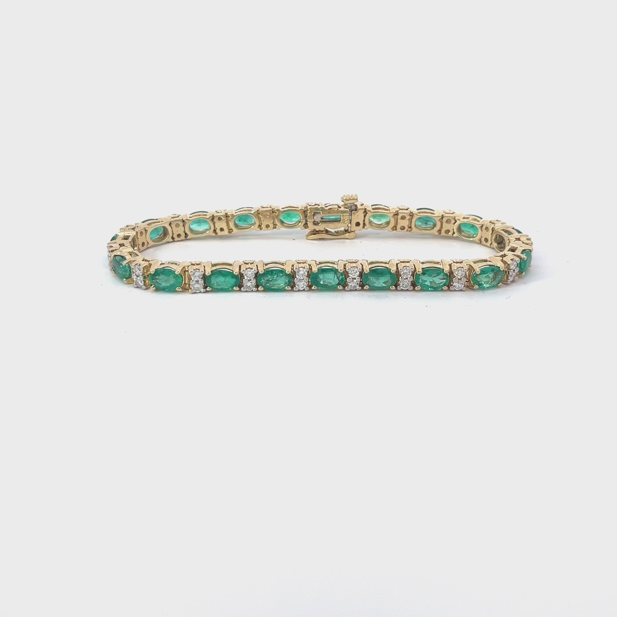 14k Yellow Gold 10.00ct Oval AA Emerald and 1.00ct G VS2 Round Diamond Tennis Bracelet