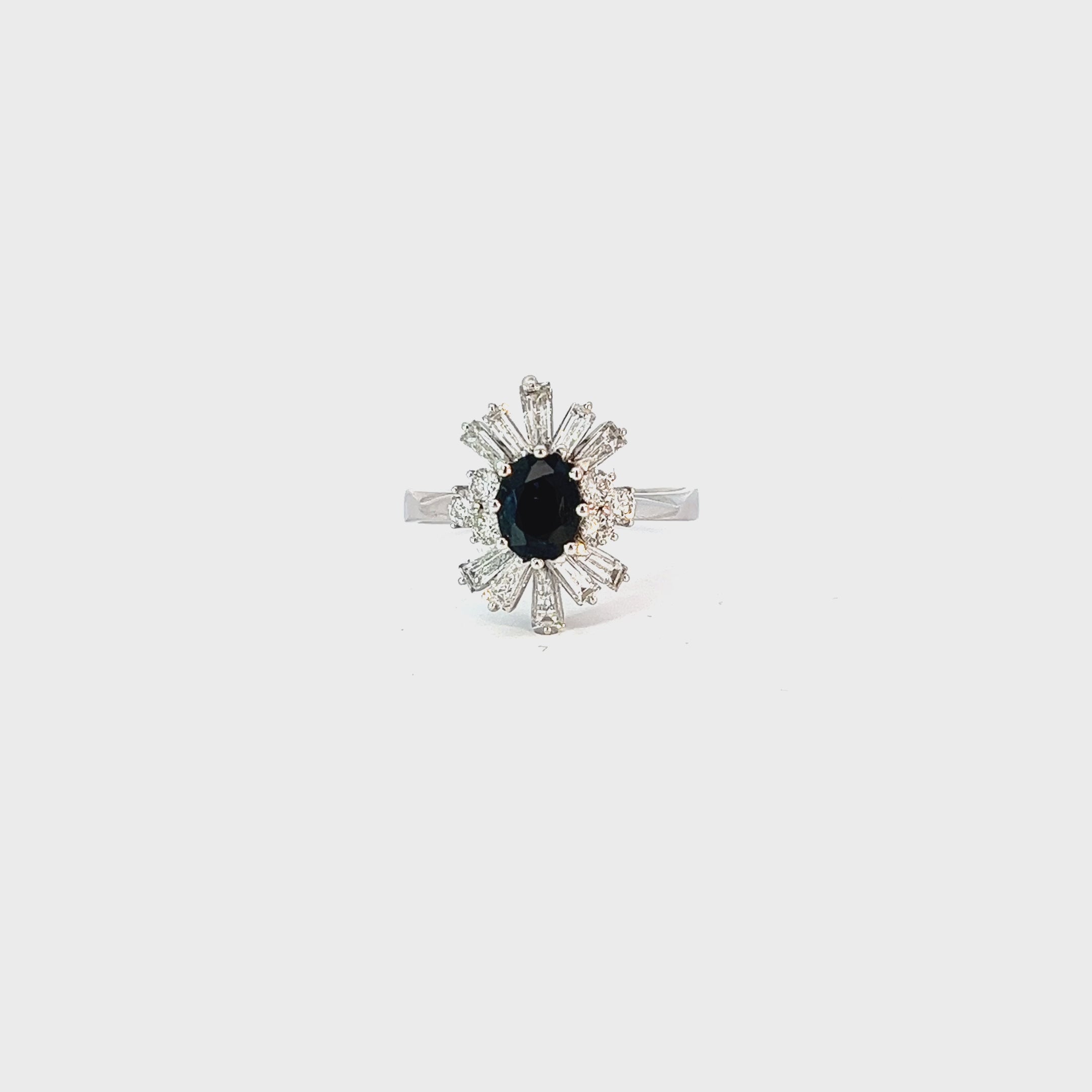 18k White Gold 1.00ct Oval Blue Sapphire and surround by 1.00ct D Vs1 Baguette and Round total weight Diamond   Ring