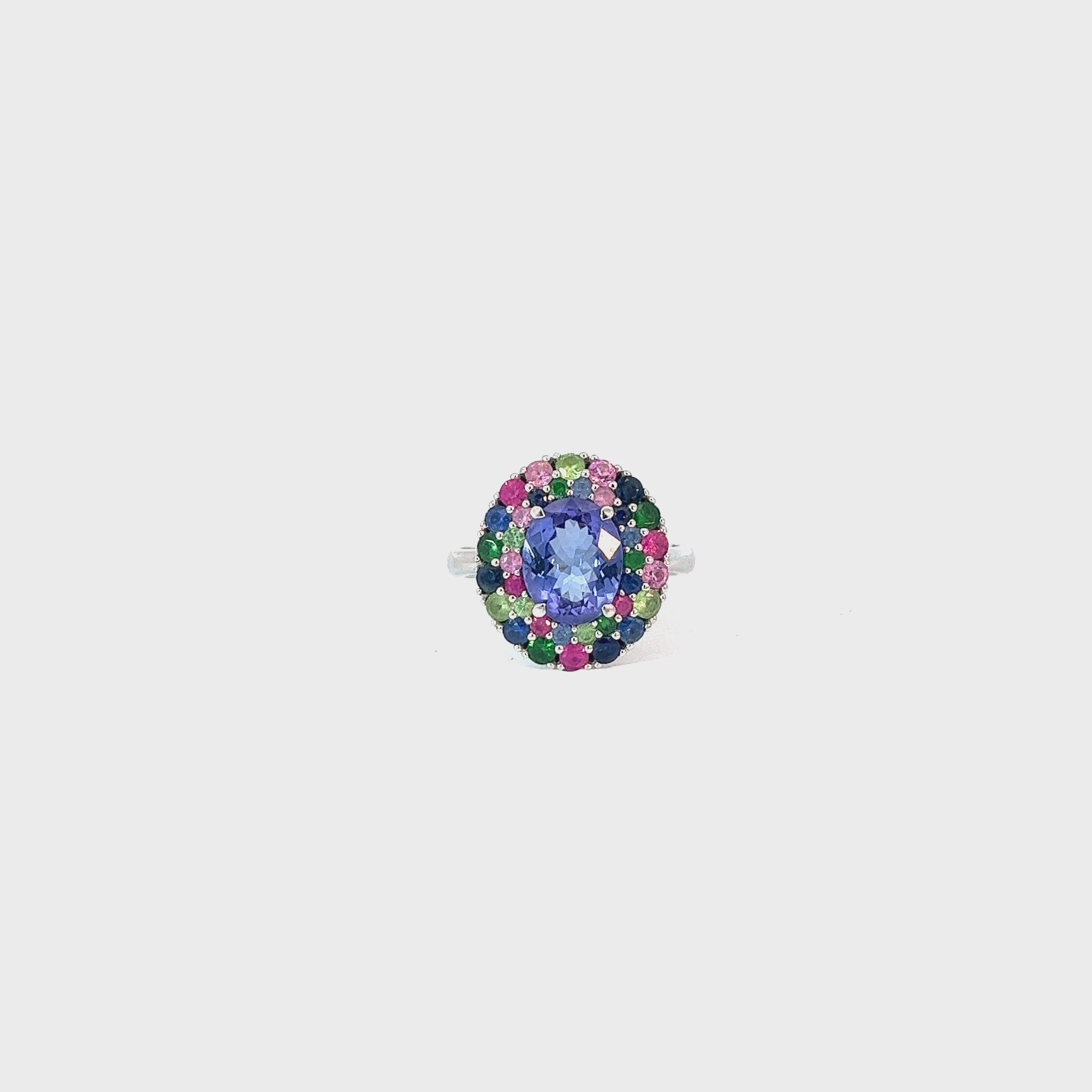 Ladies 18k white gold Tanzanite and multicolored Sapphire ring