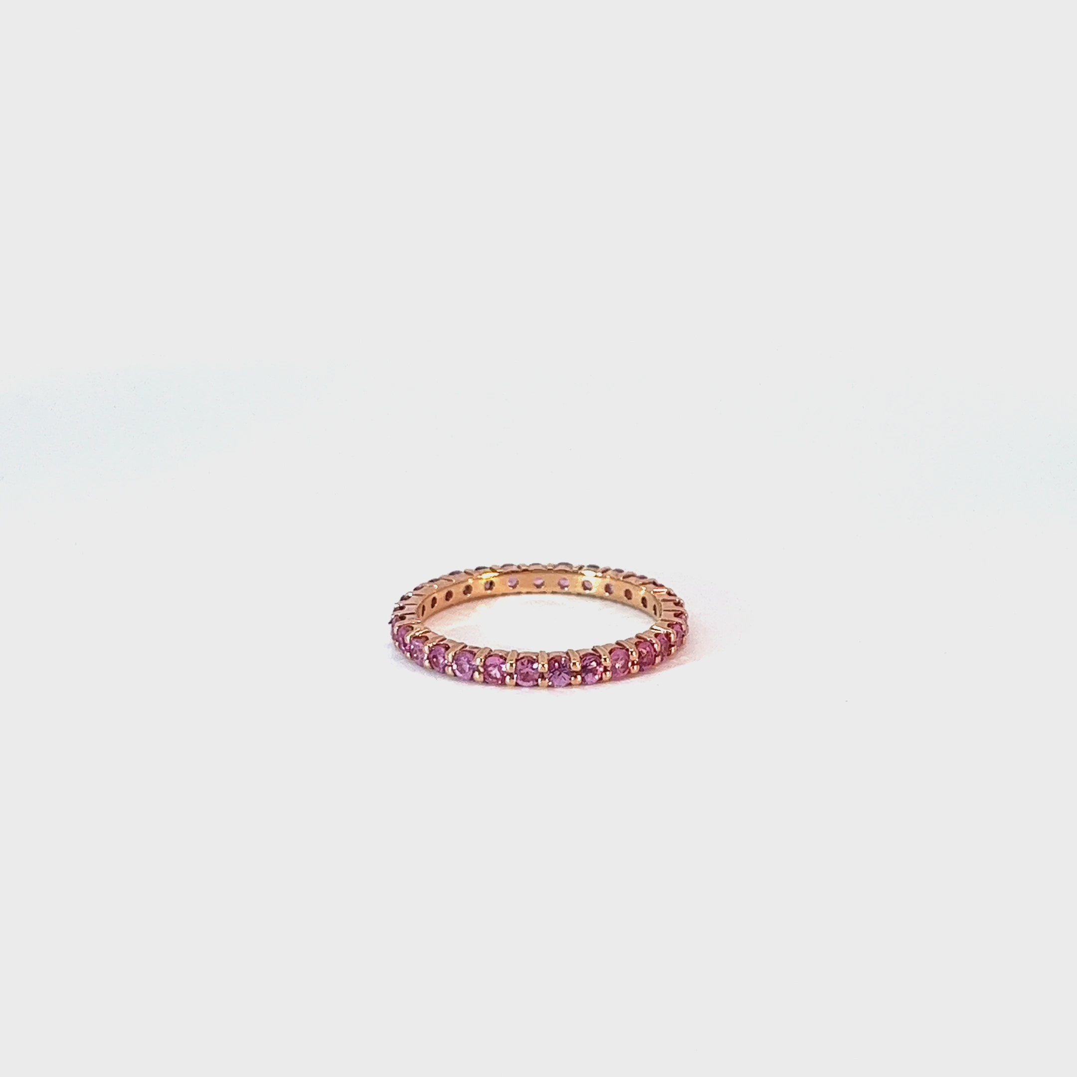 Ladies 14k Rose Gold Pink Sapphire Eternity Band Ring