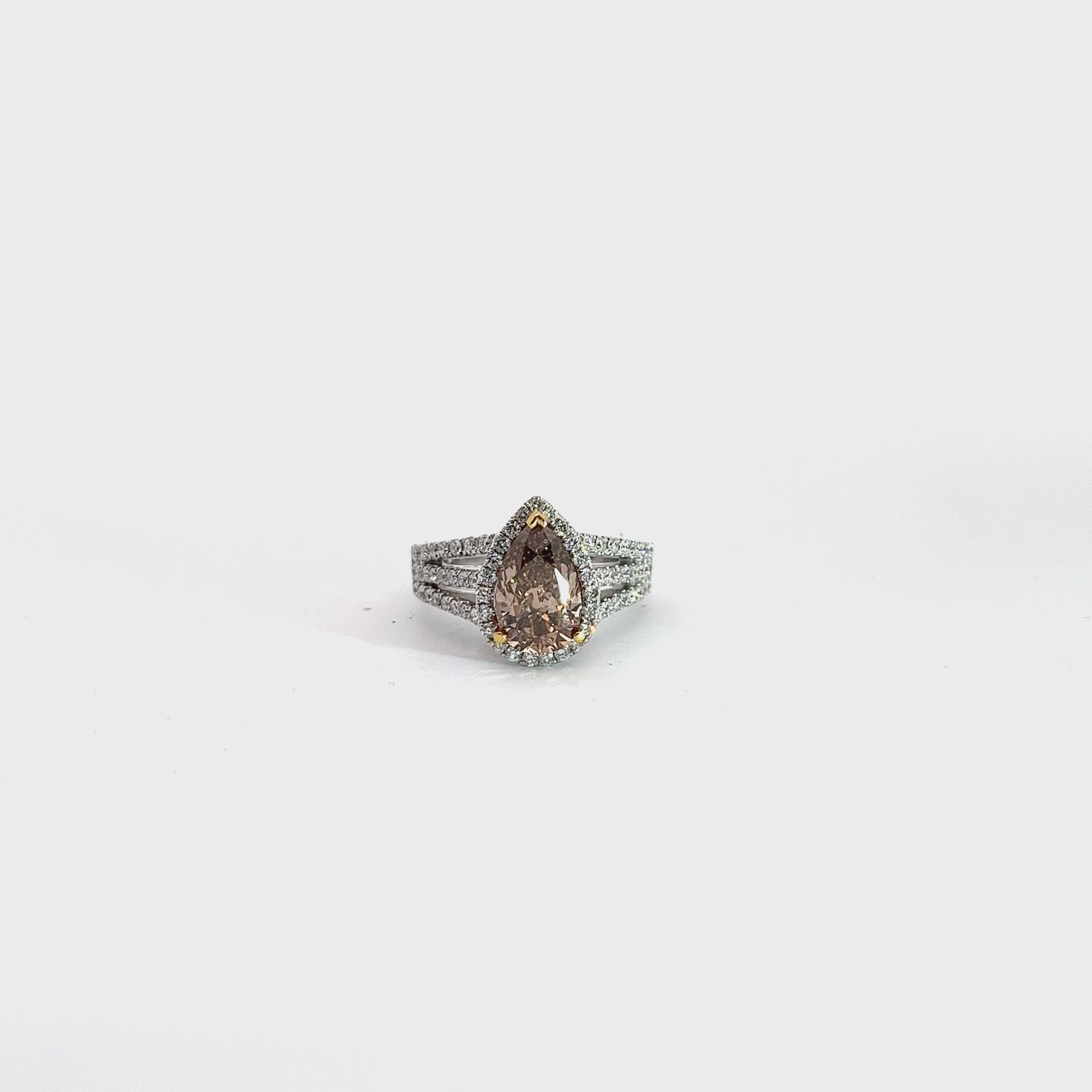 18k white gold 2.18ct  Pear Shaped Fancy Dark Orange Brown Chocolate Diamond and Surround by 3 Rows of .83ct F VS2 Round Diamond Engagement Ring Certified By GIA # 2101636068