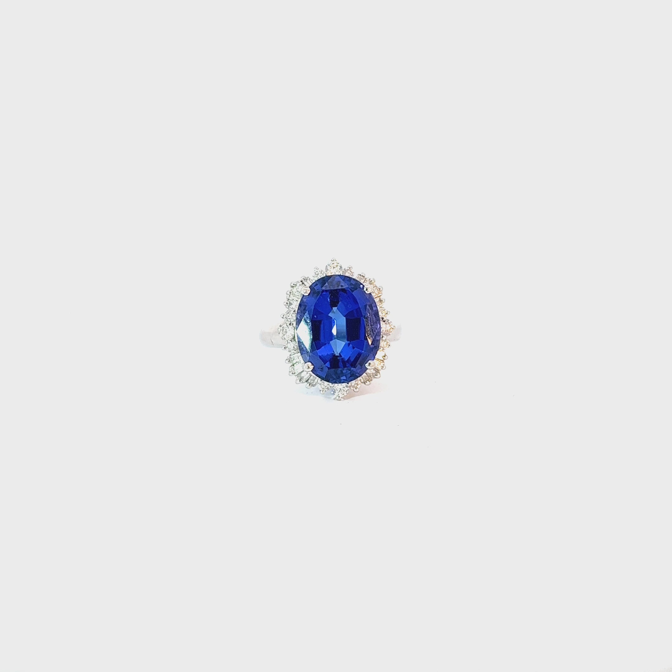 18k White Gold 10.50ct Tanzanite and 1.00ct G VS2 Round and Baguette Diamond Ring