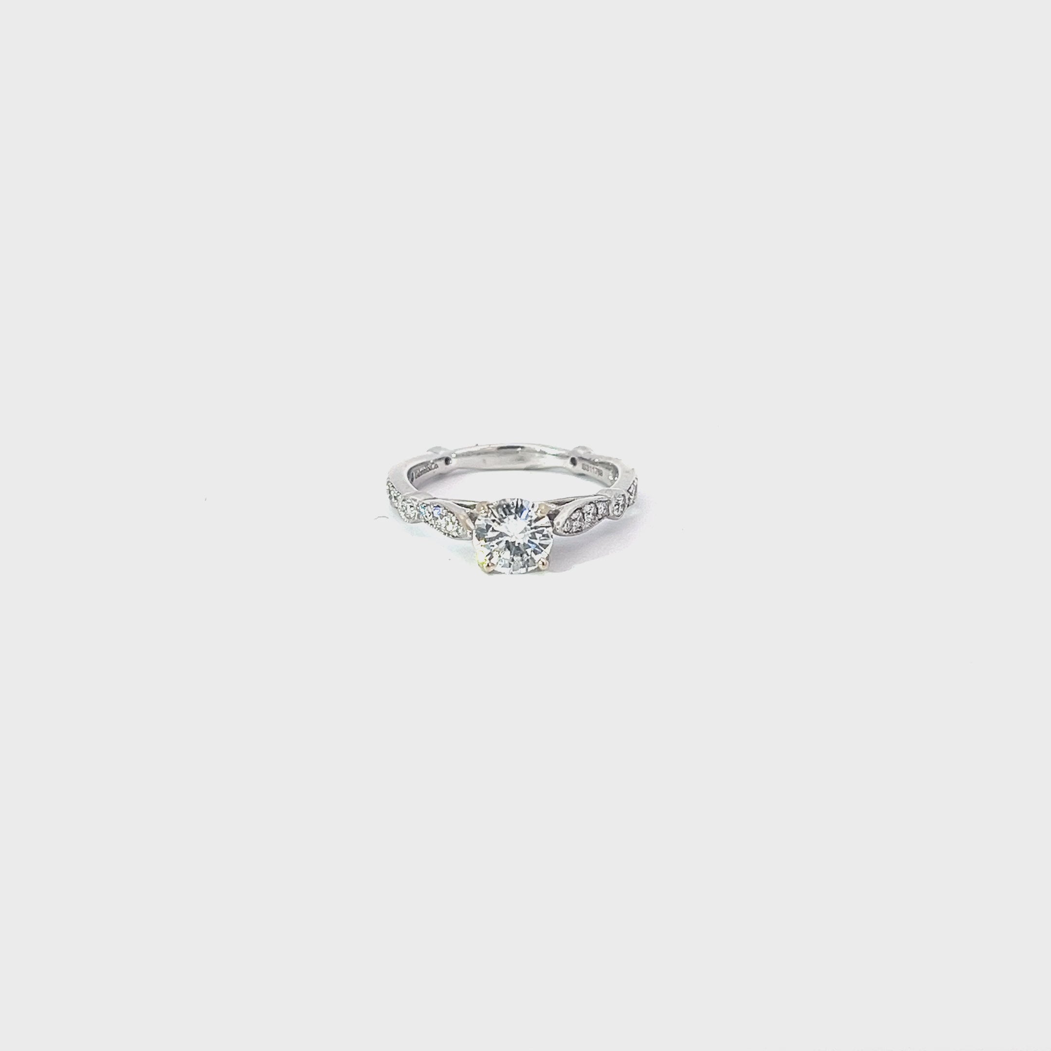 14k white gold .75ct F SI1 Round center stone Diamond and .25ct round along the band engagement ring