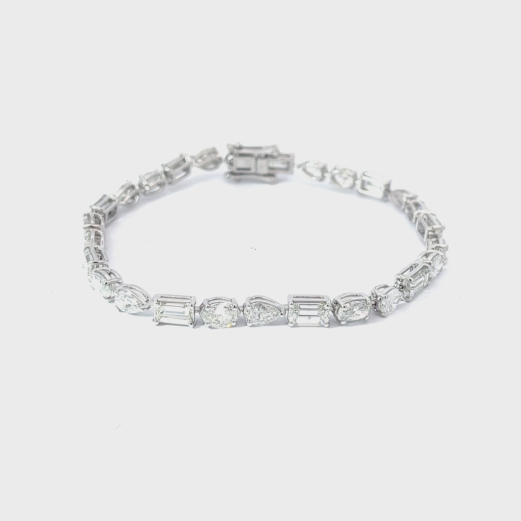 18K  WHITE GOLD 9.52CT FGVS2 MUILTI SHAPE EMERALD, OVAL, PEAR,  PRICESS CUT AND MARQUISE  7" BRACELET