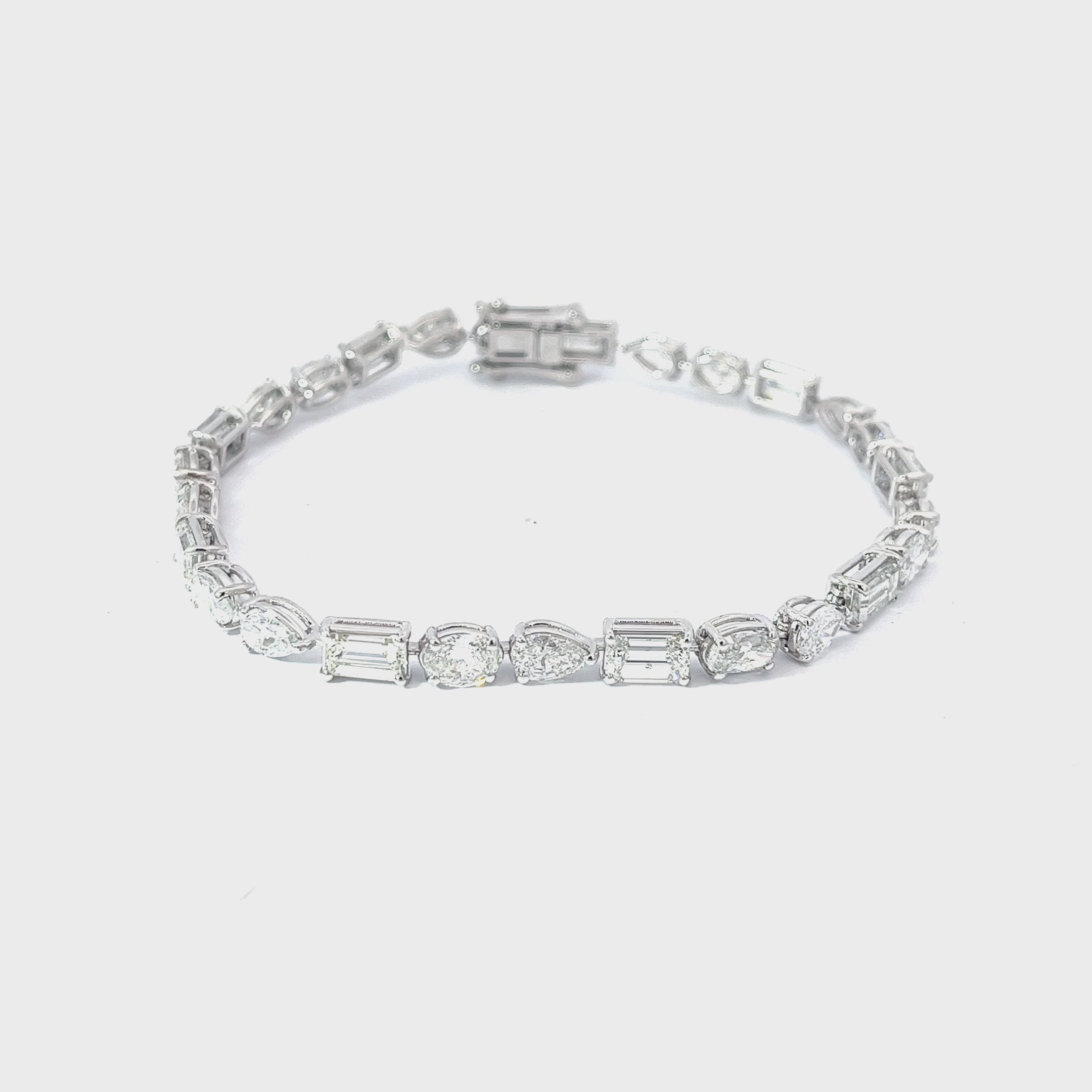 18K  WHITE GOLD 9.52CT FGVS2 MUILTI SHAPE EMERALD, OVAL, PEAR,  PRICESS CUT AND MARQUISE  7" BRACELET
