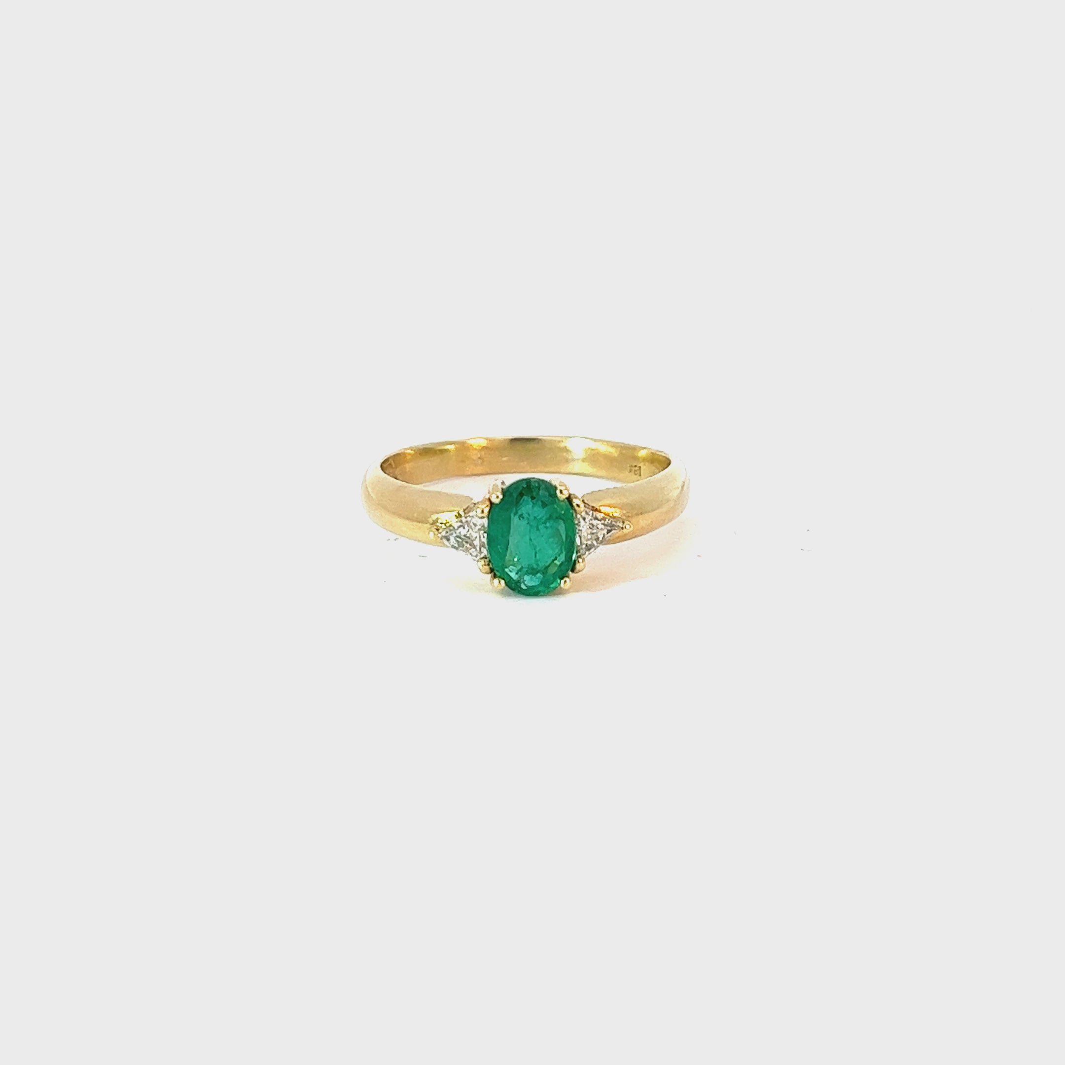 18k Yellow Gold 1.10ct Oval Colombian Emerald AA and  .30ct  F VS2 Trillion Diamond Ring