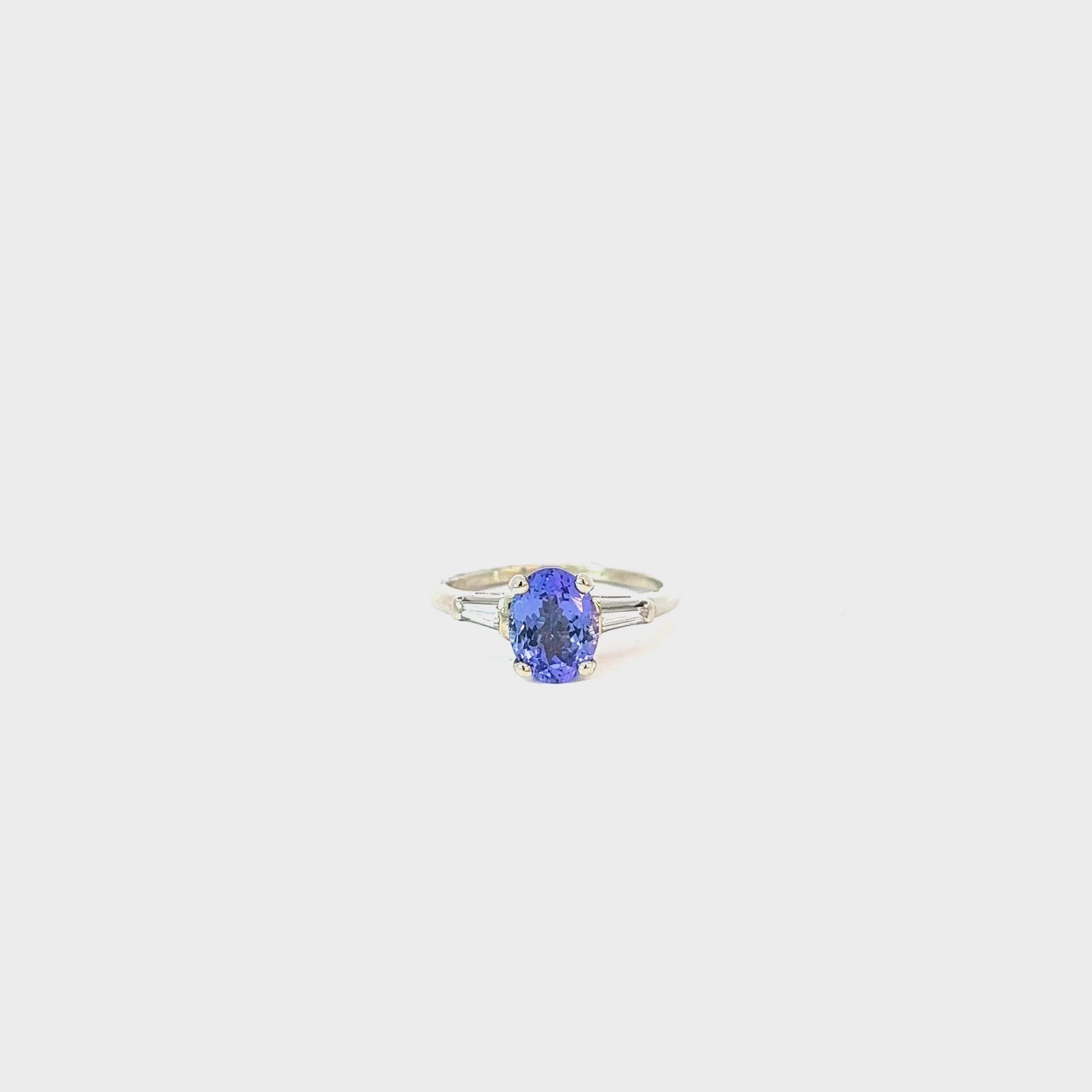 14k White Gold 1.88ct Oval-Cut AA Tanzanite and .25ct G VS2 Baguettes Diamond ring