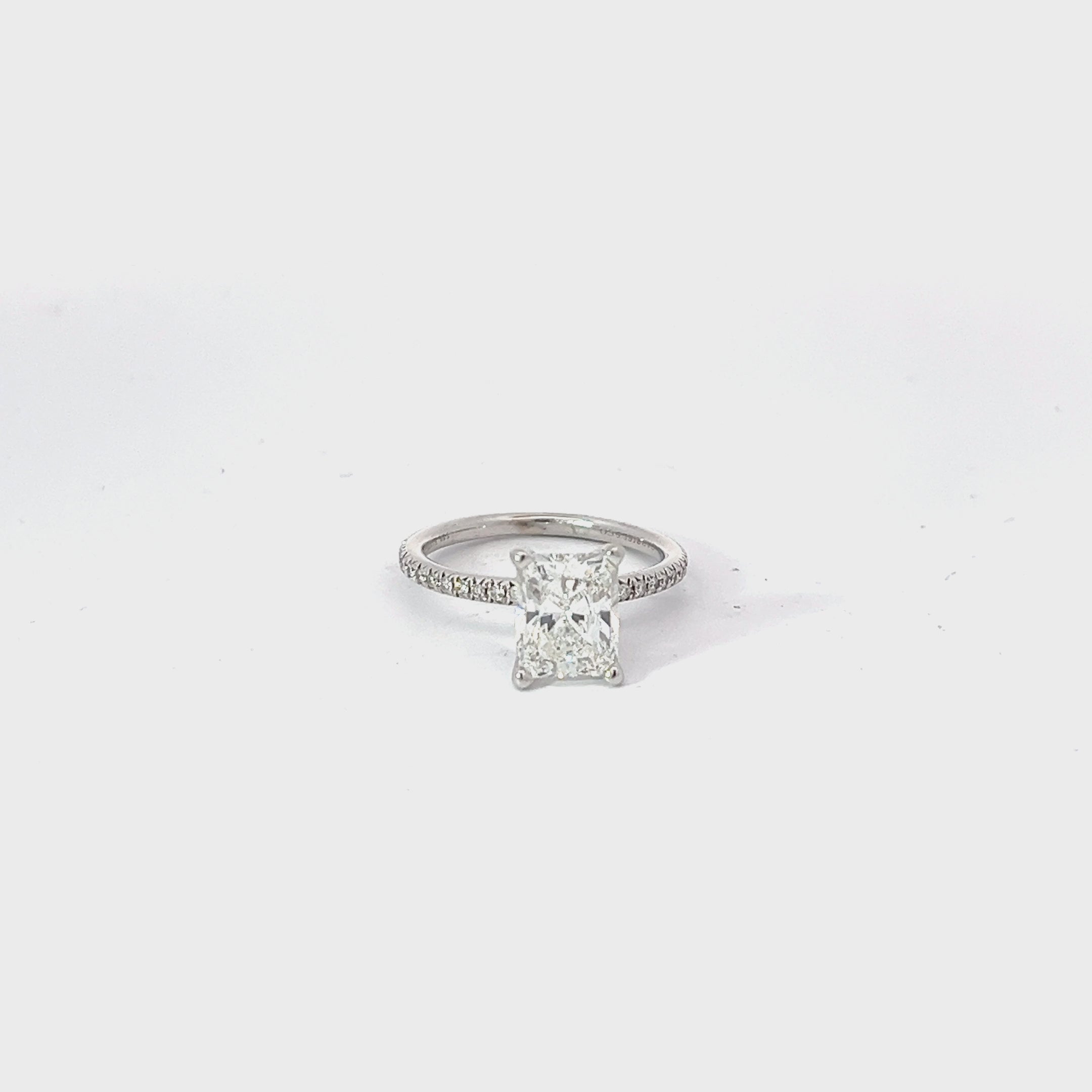 14KW 2.01CT F VS2 CUT CORNERED RECTANGULAR AND along the band .25CT G VS2 Round Diamond  Certified by GIA# 1186736871