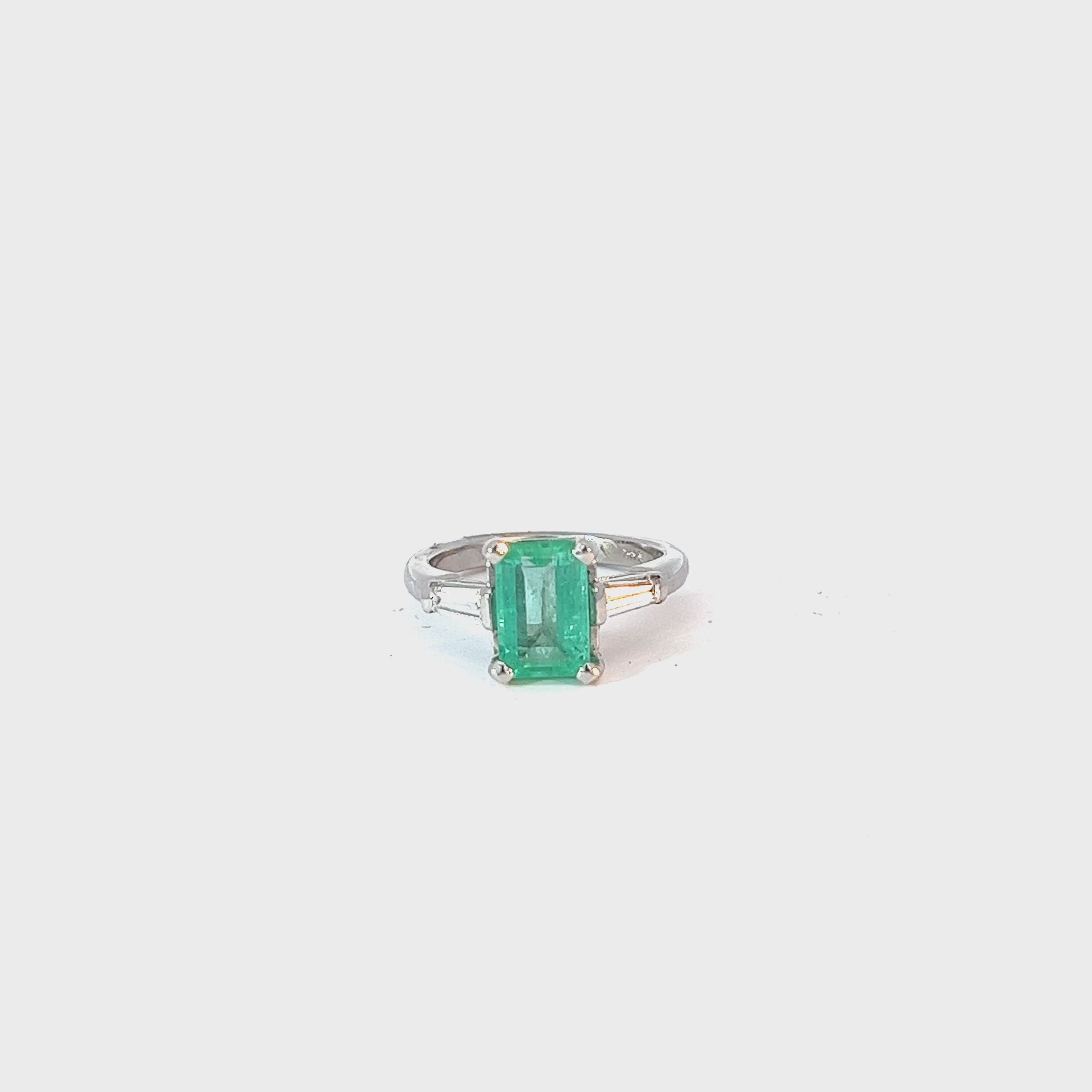 14k white gold 1.35CT EMERALD CUT Columbian emerald and .20CT F VS2 BAGUETTE  diamond ring
