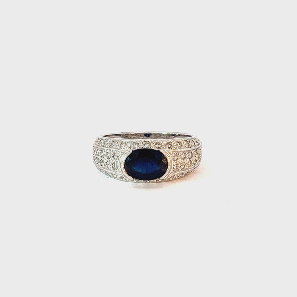 14k White Gold 1.50ct Center Oval  Blue Sapphire and surround by .50ct F VS2 Round Ring