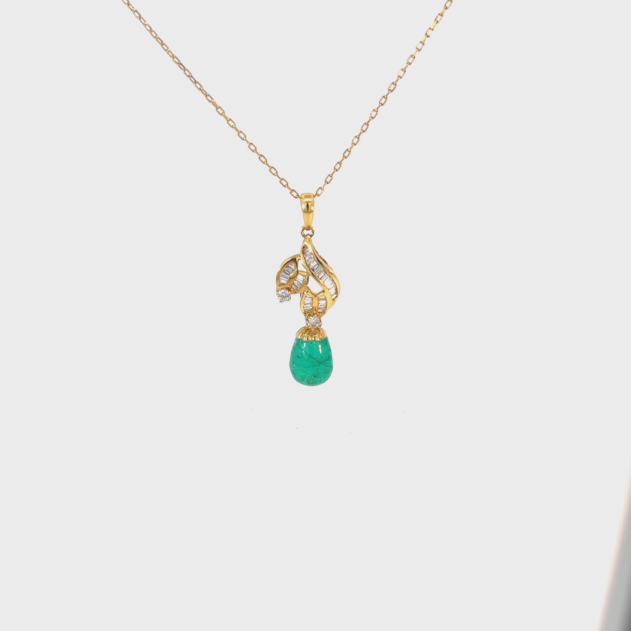 18k Yellow Gold 2.50ct Cut in a Cabochon Style Colombian Emerald/ .38ct F VS2 Total Weight of Round and Baguette Diamond Necklace