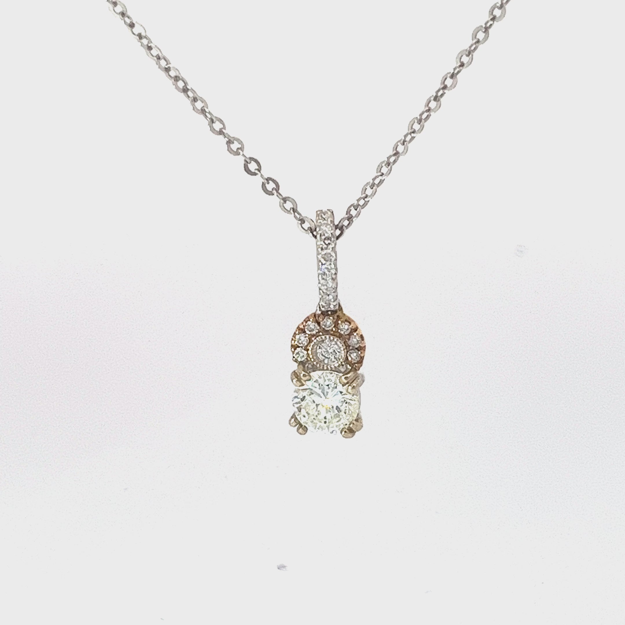 18k Two Tone .54ct G SI1 Center Round Diamond with .18ct F VS2 Round Diamond Halo Drop Necklace
